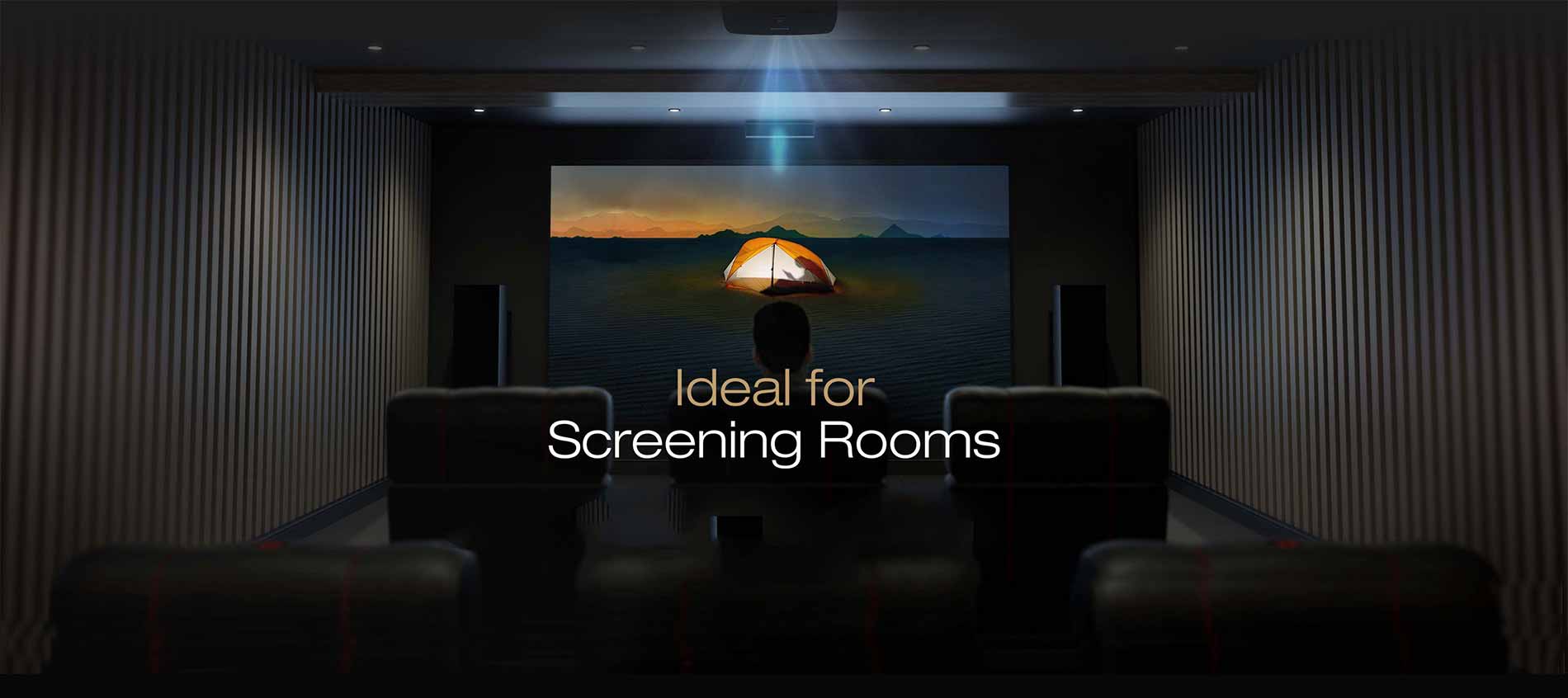 A person watching a movie from home theatre setup A person watching a movie from home theatre setup